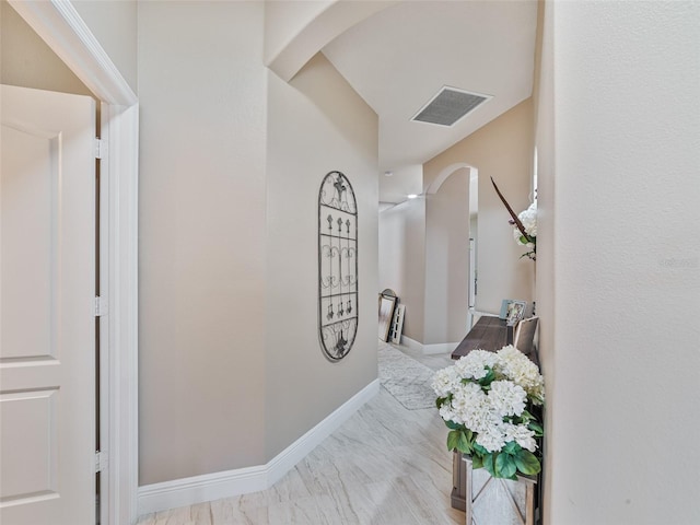 31201 Shaker Cir, Wesley Chapel, FL 33543 - corridor with arched walkways and baseboards