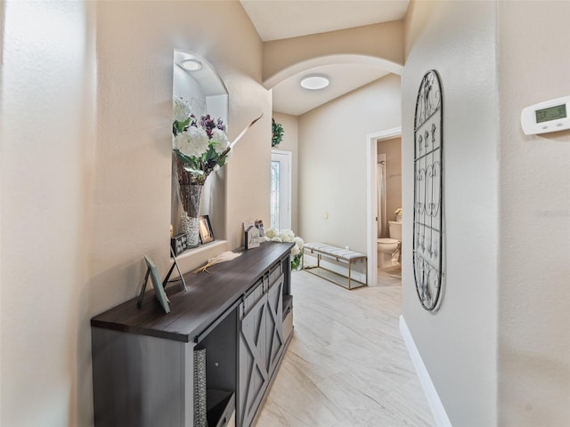 31201 Shaker Cir, Wesley Chapel, FL 33543 - hallway featuring arched walkways and baseboards