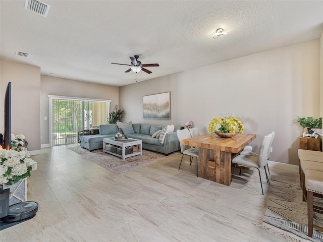 31201 Shaker Cir, Wesley Chapel, FL 33543 - living room with ceiling fan and baseboards
