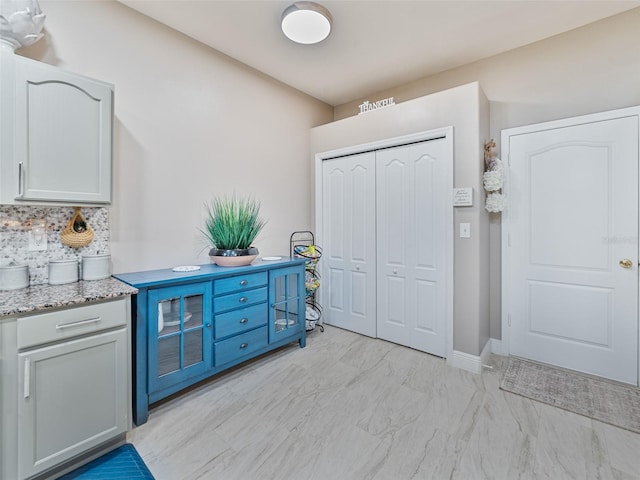31201 Shaker Cir, Wesley Chapel, FL 33543 - interior space with baseboards and light marble finish floors