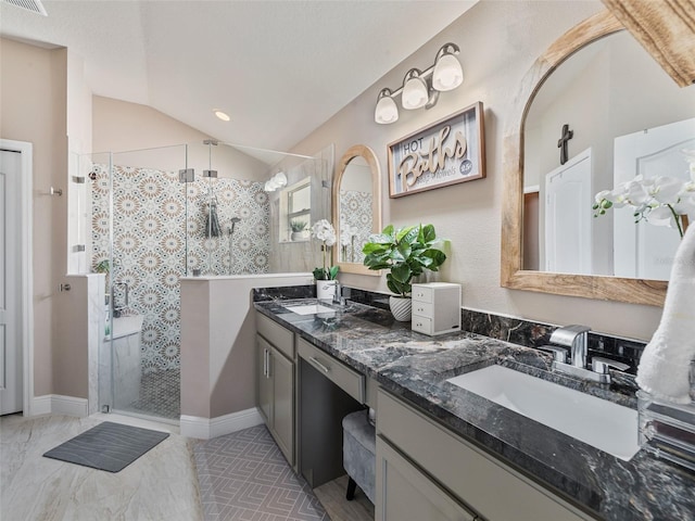31201 Shaker Cir, Wesley Chapel, FL 33543 - bathroom with a shower stall, double vanity, lofted ceiling, and recessed lighting
