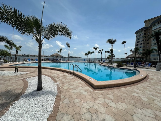 5220 Brittany Dr S Unit 1306, Saint Petersburg, FL 33715 - community pool with a patio