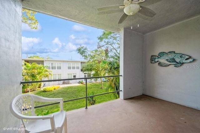 4325 58th Way N Unit 1527, Kenneth City, FL 33709 - balcony featuring a ceiling fan