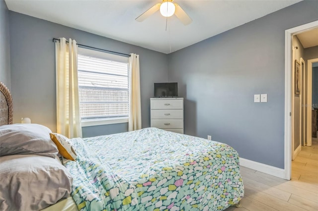 12838 Tallowood Dr, Riverview, FL 33579 - bedroom featuring light wood-style flooring, baseboards, and ceiling fan