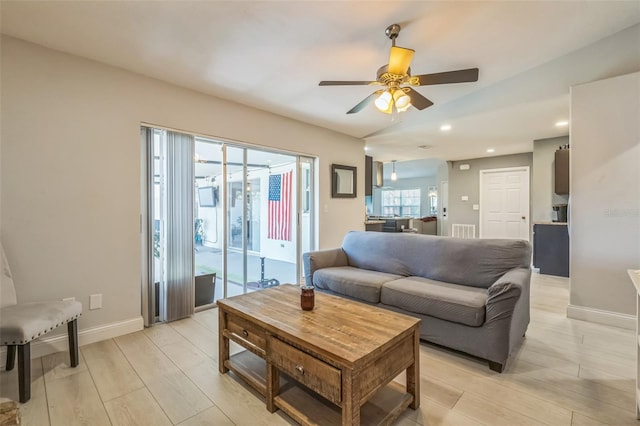 12838 Tallowood Dr, Riverview, FL 33579 - living room with light wood finished floors, ceiling fan, baseboards, and recessed lighting
