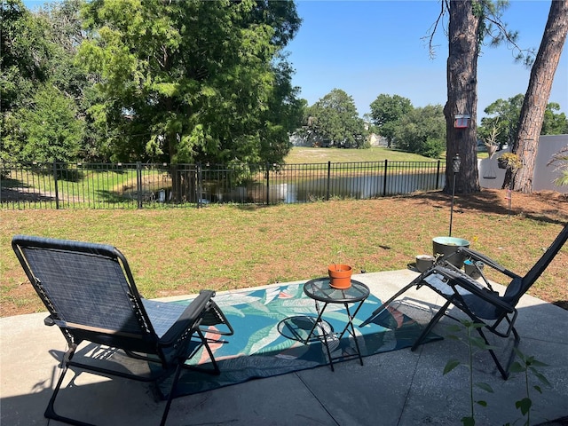 12838 Tallowood Dr, Riverview, FL 33579 - view of patio / terrace featuring view of scattered trees and a water view