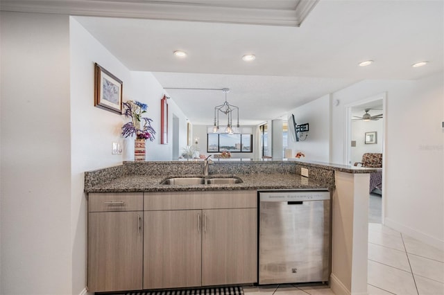 6322 Palma Del Mar Blvd S Unit 1107, Saint Petersburg, FL 33715 - kitchen featuring stainless steel dishwasher, a sink, dark stone countertops, a peninsula, and light tile patterned floors