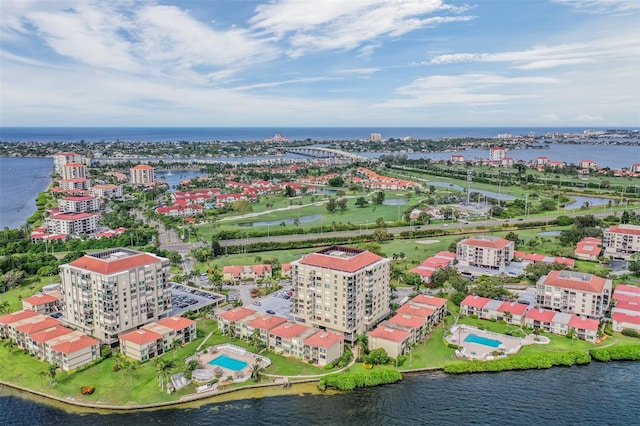 6322 Palma Del Mar Blvd S Unit 1107, Saint Petersburg, FL 33715 - drone / aerial view of apartment complex / building, a nearby body of water, and a pool