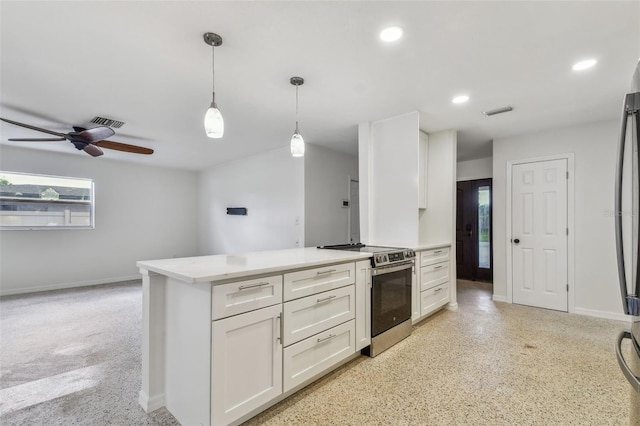 4400 Helena St NE, Saint Petersburg, FL 33703 - kitchen with stainless steel electric stove, white cabinetry, a ceiling fan, light countertops, and baseboards