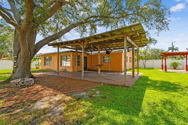4400 Helena St NE, Saint Petersburg, FL 33703 - back of property featuring a patio