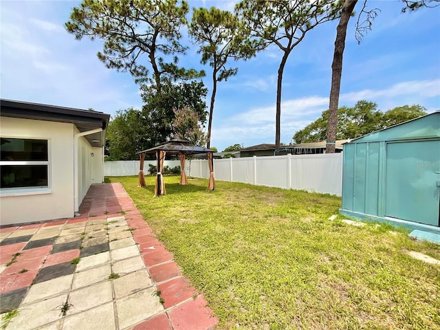 1290 Michigan Blvd, Dunedin, FL 34698 - fenced backyard with a gazebo and a shed