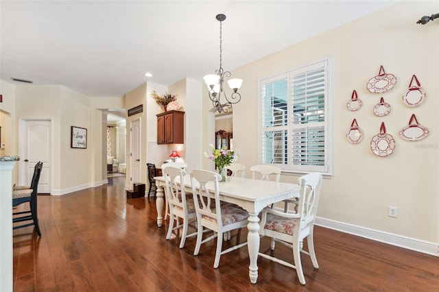 16039 Ternglade Dr, Lithia, FL 33547 - dining space with dark wood-type flooring, a chandelier, baseboards, and recessed lighting