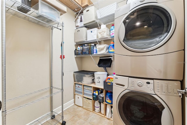 16039 Ternglade Dr, Lithia, FL 33547 - laundry room with estacked washer and dryer and baseboards