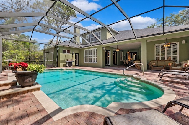 16039 Ternglade Dr, Lithia, FL 33547 - swimming pool with ceiling fan, a patio, an outdoor living space, and glass enclosure