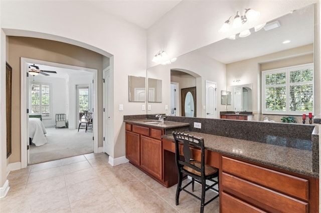 16039 Ternglade Dr, Lithia, FL 33547 - full bath with vanity, ceiling fan, ensuite bath, and tile patterned floors