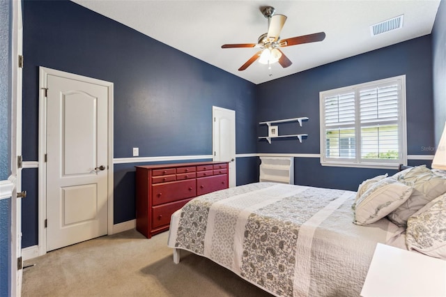 16039 Ternglade Dr, Lithia, FL 33547 - bedroom with light colored carpet and ceiling fan