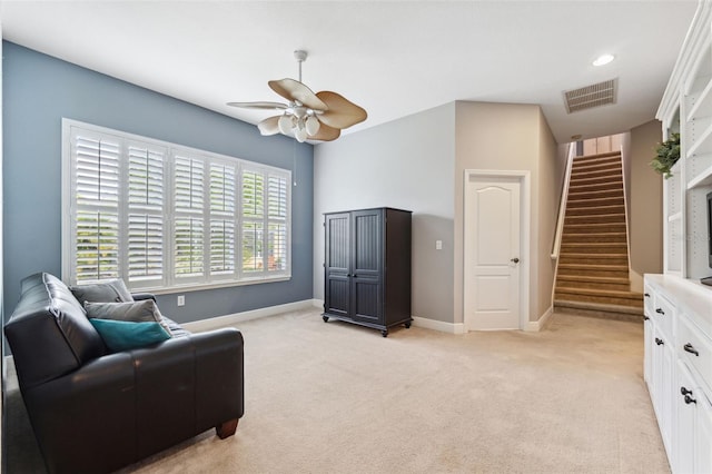 16039 Ternglade Dr, Lithia, FL 33547 - sitting room with ceiling fan, light colored carpet, and stairway