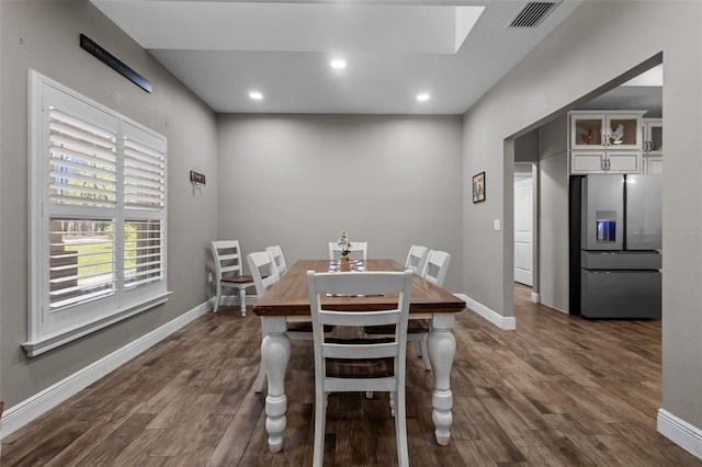 12090 Thames Ave, Weeki Wachee, FL 34614 - dining area featuring dark wood-style floors, baseboards, and recessed lighting