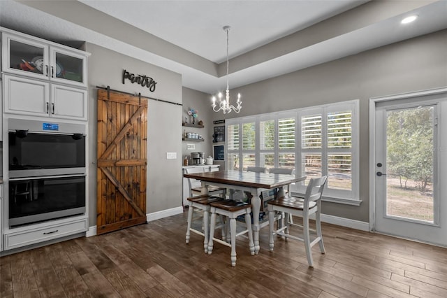 12090 Thames Ave, Weeki Wachee, FL 34614 - dining room with a barn door, a chandelier, baseboards, dark wood-style floors, and recessed lighting