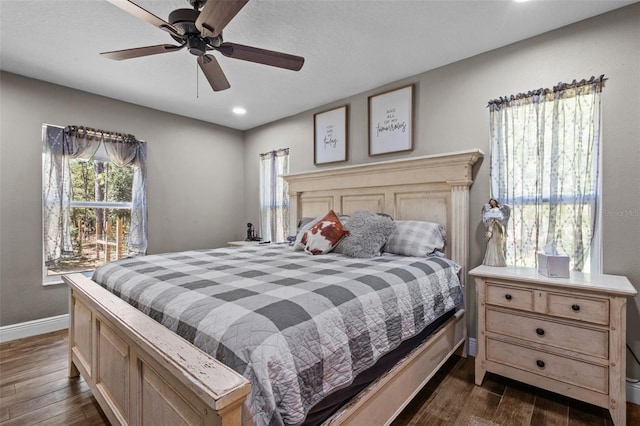 12090 Thames Ave, Weeki Wachee, FL 34614 - bedroom featuring dark wood finished floors, baseboards, recessed lighting, and a ceiling fan