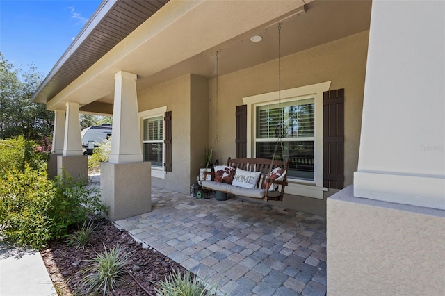 12090 Thames Ave, Weeki Wachee, FL 34614 - view of covered porch