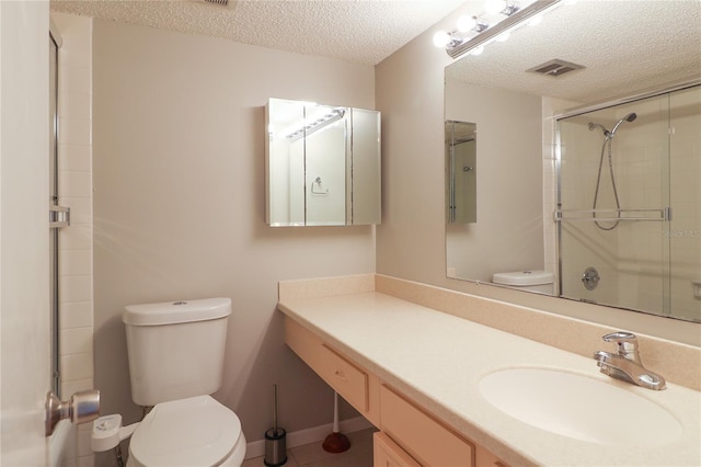 7400 Sun Island Dr S Unit 501, South Pasadena, FL 33707 - bathroom featuring toilet, a textured ceiling, a shower with door, and vanity
