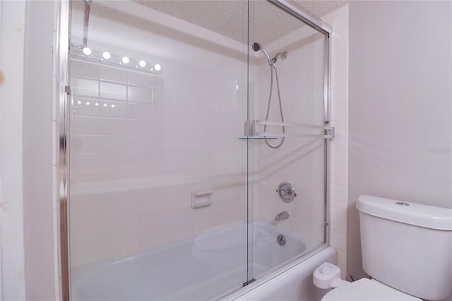 7400 Sun Island Dr S Unit 501, South Pasadena, FL 33707 - full bath featuring toilet and bath / shower combo with glass door
