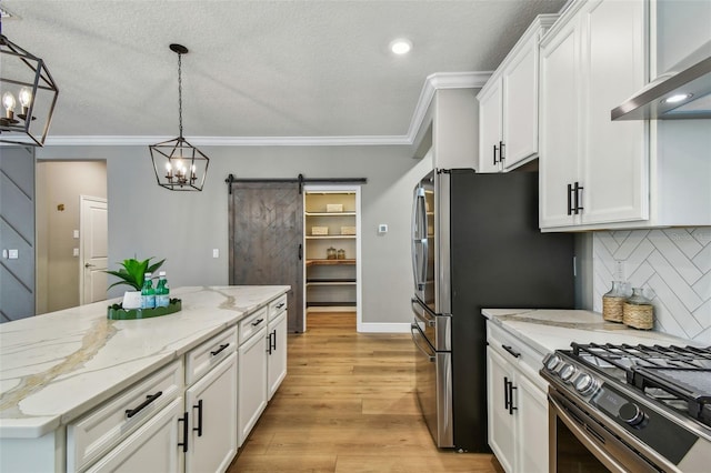 17589 Cruiser Bnd, Land O Lakes, FL 34638 - kitchen featuring wall chimney range hood, a chandelier, white cabinets, ornamental molding, and backsplash
