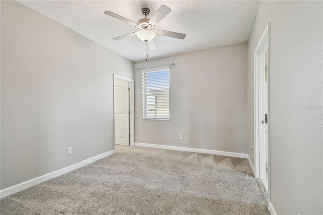 17589 Cruiser Bnd, Land O Lakes, FL 34638 - carpeted empty room with a textured ceiling, a ceiling fan, and baseboards