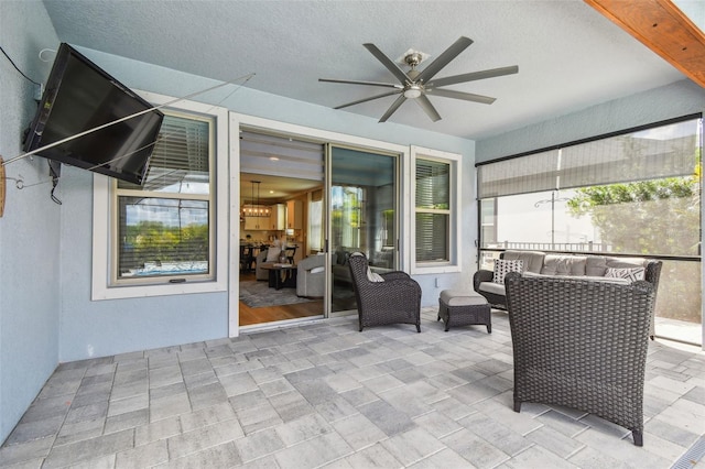 17589 Cruiser Bnd, Land O Lakes, FL 34638 - view of patio / terrace with ceiling fan and an outdoor living space