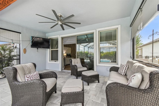 17589 Cruiser Bnd, Land O Lakes, FL 34638 - sunroom / solarium featuring outdoor lounge area, ceiling fan, and plenty of natural light