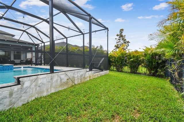 17589 Cruiser Bnd, Land O Lakes, FL 34638 - view of pool featuring a yard, an outdoor hangout area, a patio, a pool with connected hot tub, and a lanai
