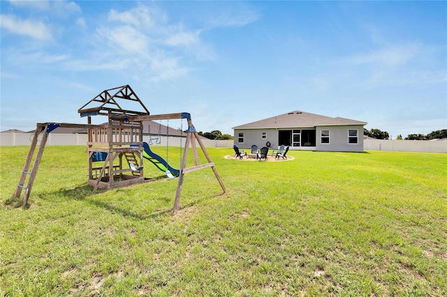 4435 Devinshire Fields Loop, Plant City, FL 33567 - view of yard featuring an outdoor fire pit and a playground