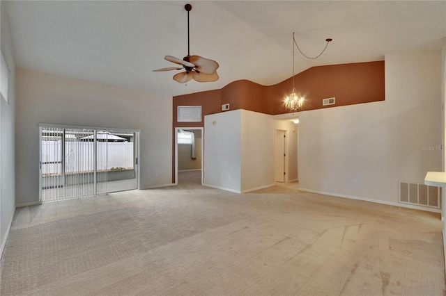 2527 Wrencrest Cir, Valrico, FL 33594 - unfurnished room with ceiling fan, light colored carpet, high vaulted ceiling, a chandelier, and baseboards