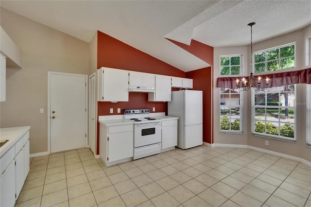 2527 Wrencrest Cir, Valrico, FL 33594 - kitchen featuring white appliances, under cabinet range hood, a chandelier, light countertops, and hanging light fixtures