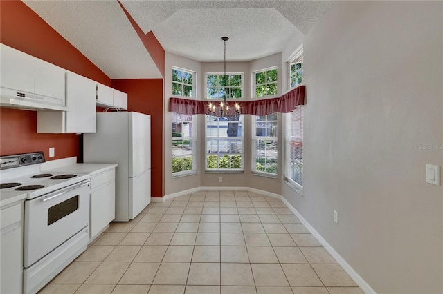 2527 Wrencrest Cir, Valrico, FL 33594 - kitchen featuring under cabinet range hood, white appliances, a chandelier, a textured ceiling, and white cabinetry
