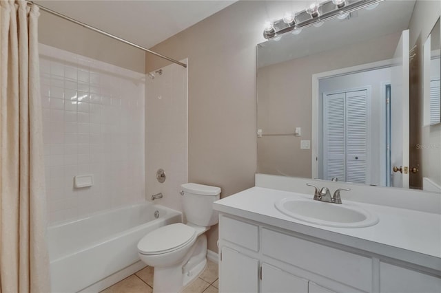 2527 Wrencrest Cir, Valrico, FL 33594 - full bathroom featuring shower / bathtub combination with curtain, toilet, tile patterned flooring, vanity, and baseboards