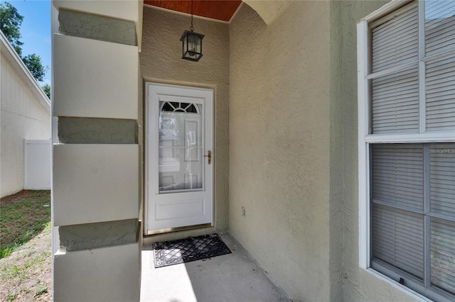 2527 Wrencrest Cir, Valrico, FL 33594 - view of exterior entry featuring stucco siding