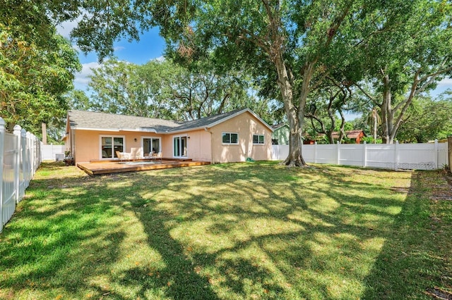 11510 92nd Way, Largo, FL 33773 - rear view of house featuring a wooden deck