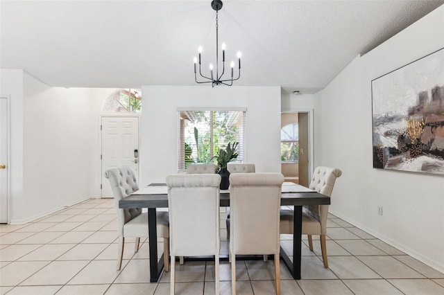 11510 92nd Way, Largo, FL 33773 - dining room featuring a chandelier, light tile patterned floors, and a textured ceiling