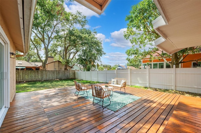 11510 92nd Way, Largo, FL 33773 - wooden terrace featuring a fenced backyard and an outdoor hangout area