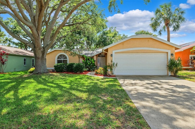 11510 92nd Way, Largo, FL 33773 - ranch-style house featuring stucco siding, a garage, concrete driveway, and a front yard