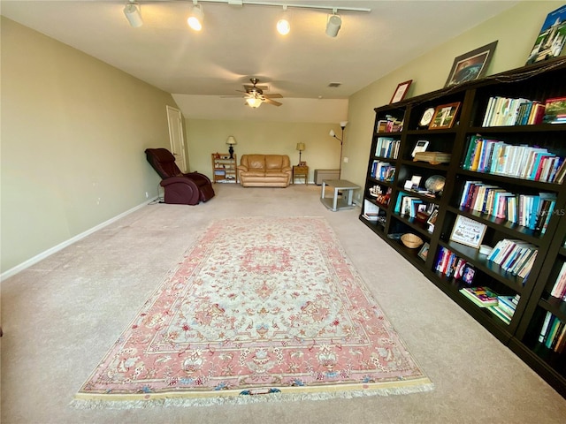 4808 Jewell Ter, Palm Harbor, FL 34685 - living area with carpet floors, ceiling fan, and baseboards
