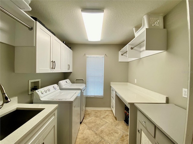 4808 Jewell Ter, Palm Harbor, FL 34685 - washroom featuring cabinet space, separate washer and dryer, baseboards, and a textured ceiling