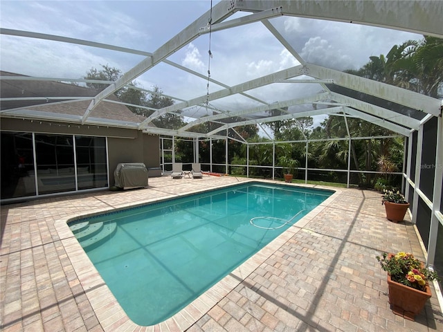 4808 Jewell Ter, Palm Harbor, FL 34685 - outdoor pool featuring a patio and a lanai