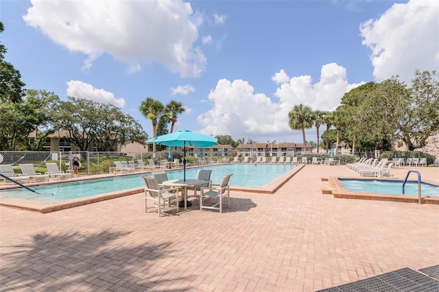 6334 Spring Flower Dr Unit 24, New Port Richey, FL 34653 - community pool with a patio