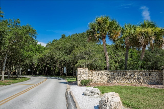 6334 Spring Flower Dr Unit 24, New Port Richey, FL 34653 - view of asphalt street with traffic signs