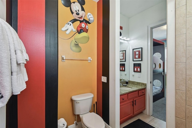 7523 Excitement Dr, Kissimmee, FL 34747 - bathroom with vanity, tile patterned flooring, and toilet
