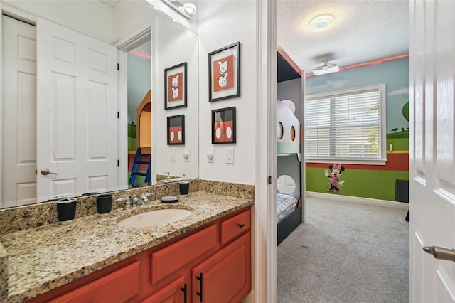7523 Excitement Dr, Kissimmee, FL 34747 - bathroom with vanity and baseboards