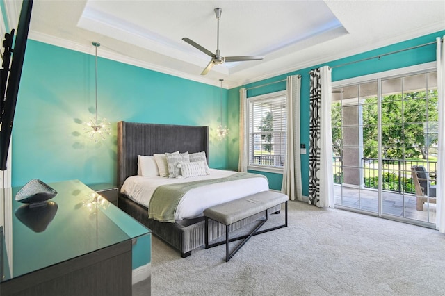 7523 Excitement Dr, Kissimmee, FL 34747 - bedroom with access to exterior, a raised ceiling, carpet floors, crown molding, and ceiling fan